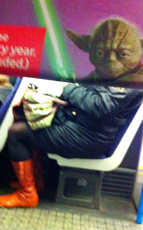 Funny Newspaper Photobombs Amuse This Bored Commuter