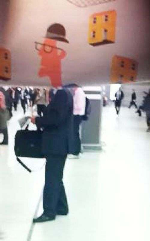 Funny Newspaper Photobombs Amuse This Bored Commuter