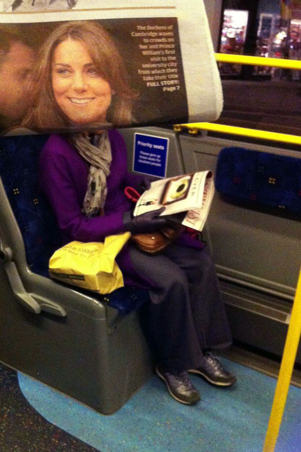 Funny Newspaper Photobombs Amuse This Bored Commuter