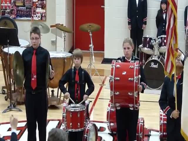 Kid Breaks Cymbal during National Anthem, Gets through like a Boss… 