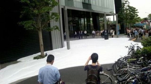 Tokyo Sidewalk Covered in a Sea of Foamy Bubbles