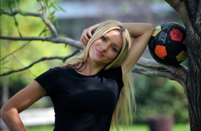 This Blonde Bombshell Is a Football Fanatic