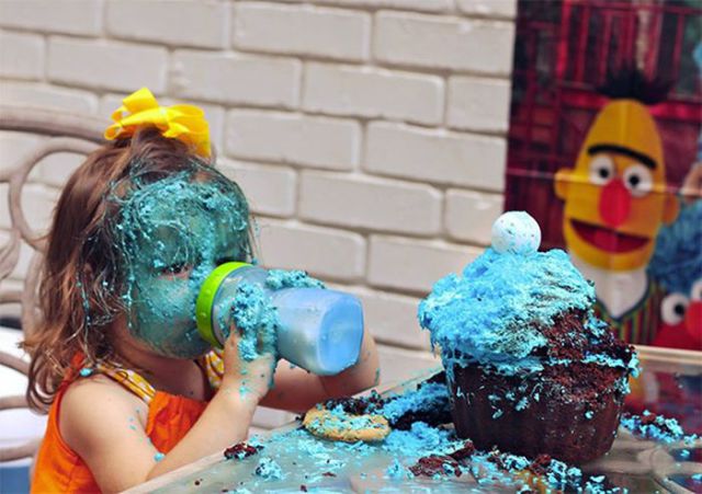 Cute Girl Demolishes Her Cookie Monster Cake