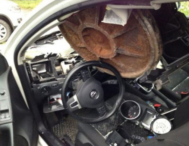 Manhole Cover vs Car