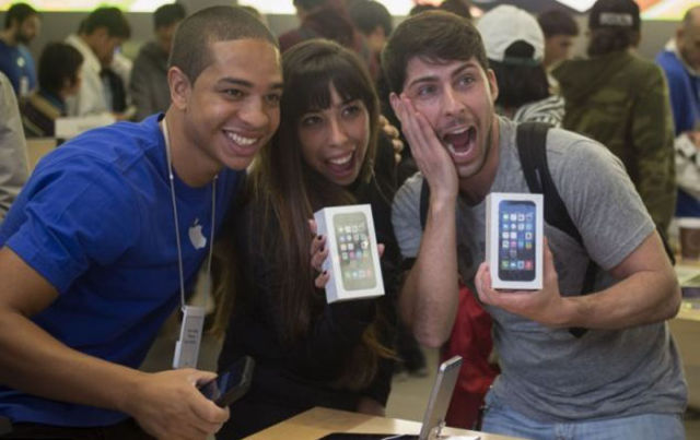 The iPhone 5 Frenzy as People Line Up to Get Theirs First