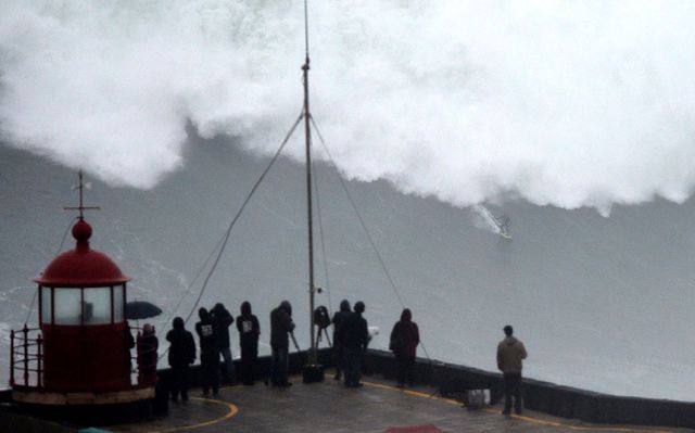 Crazy Thrill-Seeking Surfers Ride Giant Wave after Storm in Portugal