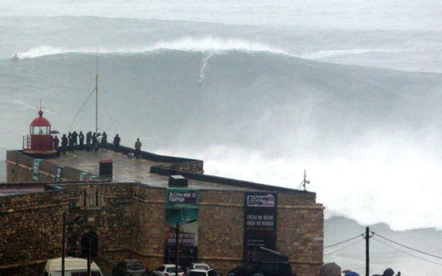 Crazy Thrill-Seeking Surfers Ride Giant Wave after Storm in Portugal