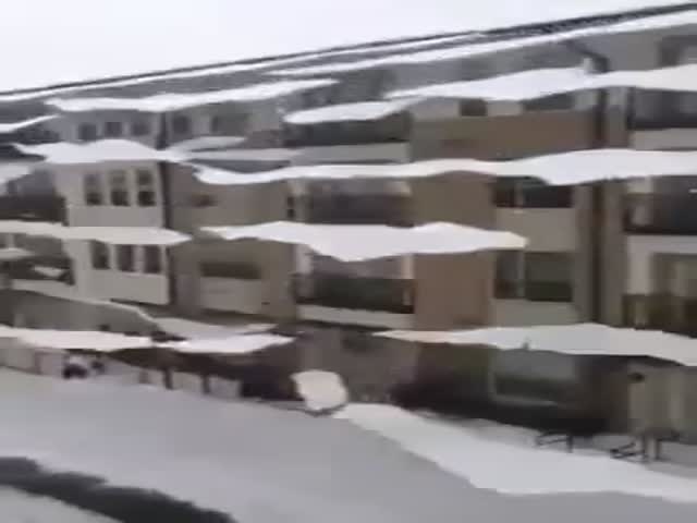 Avalanche of Flying Ice Sheets Falling Off a Texas Building 