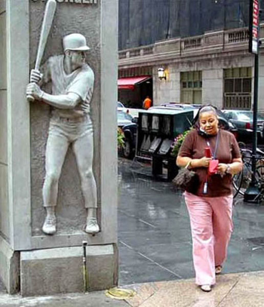 People Making a Mockery of Statues