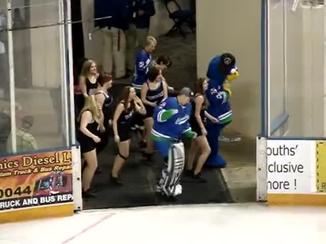 Pro Hockey Goalie Does the Wobble with the Dance Team  (VIDEO)