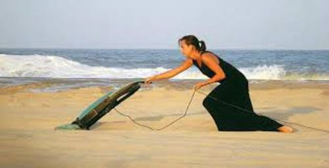 Women Practice Some Outdoor Vacuuming