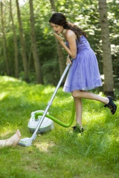 Women Practice Some Outdoor Vacuuming