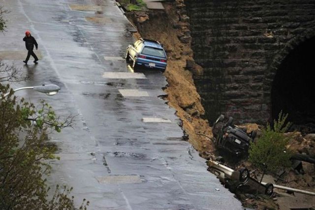 Road Collapses and Swallows Cars in the Process