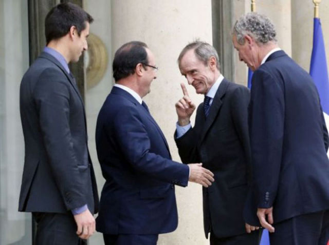 The French President Sucks at Handshakes