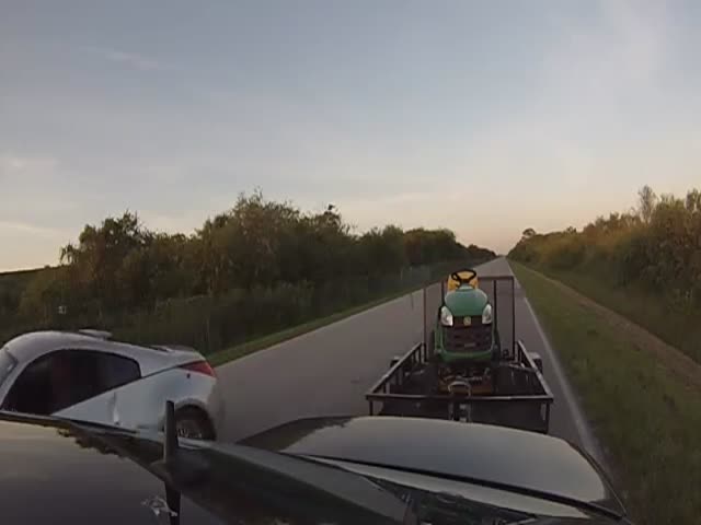 Mercedes E55 Driver Races Trash-Talking Nissan 350z Driver... While Towing a Lawnmower!  (VIDEO)