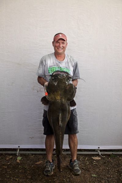 Giant Catfish Noodling Is an Odd Sport