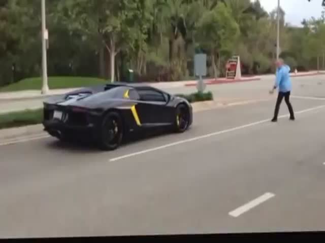Some Guy Throws a Rock at a Lamborghini Aventador  (VIDEO)