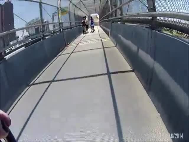 Car vs Cyclist on Pedestrian Bridge  (VIDEO)