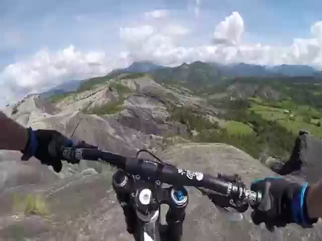 Extreme Biker Rides through Narrowest Mountain Edge Ever 