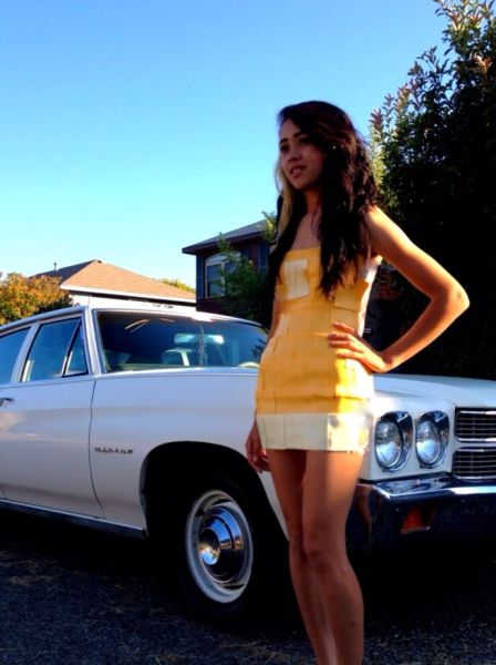 Girls Pose with Cars Wearing the Latest Fashionable Dress