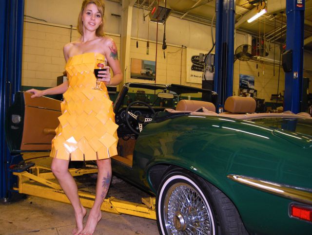 Girls Pose with Cars Wearing the Latest Fashionable Dress