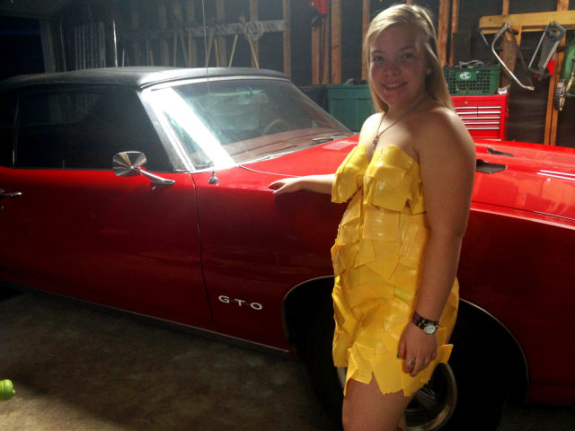 Girls Pose with Cars Wearing the Latest Fashionable Dress