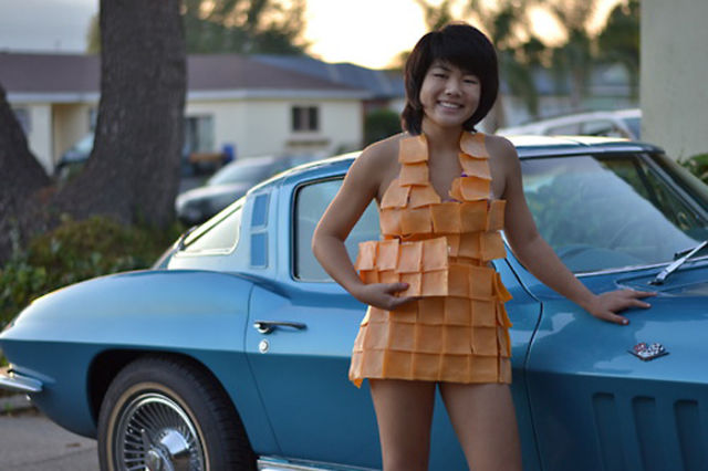 Girls Pose with Cars Wearing the Latest Fashionable Dress