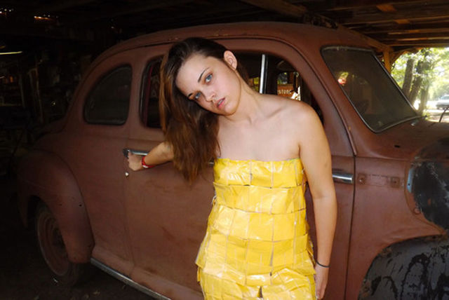 Girls Pose with Cars Wearing the Latest Fashionable Dress