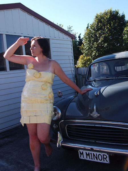 Girls Pose with Cars Wearing the Latest Fashionable Dress