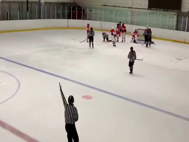 Russian Hockey Player Breaks Stick over American Girl's Head  (VIDEO)