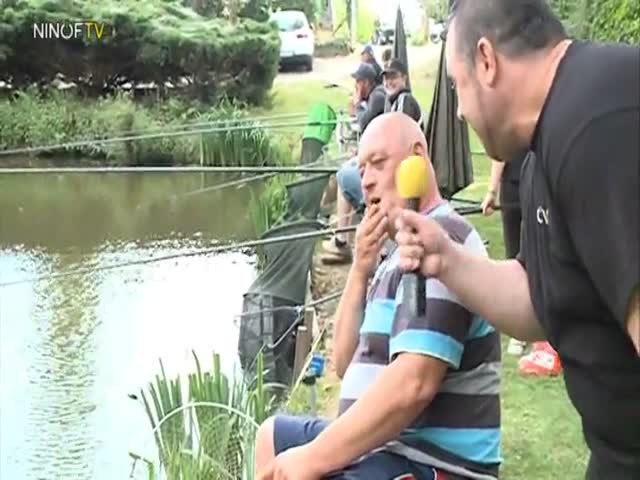 Drunk Belgian Fisherman Gets Interviewed during Fishing Contest...  (VIDEO)