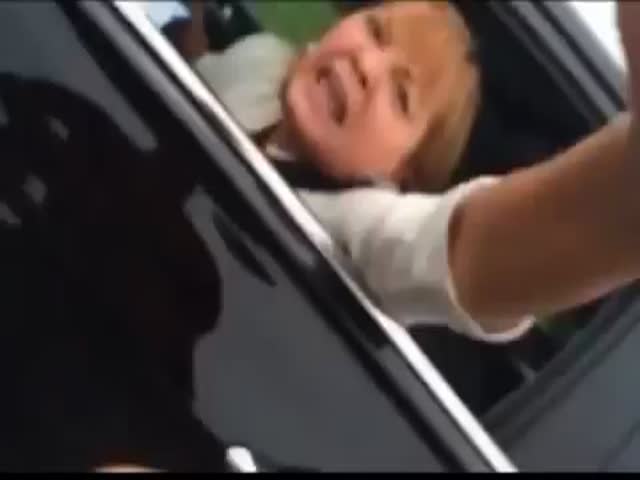 Crazy Racist Woman Freaks Out after Nearly Getting into an Accident  (VIDEO)