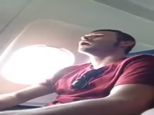 Guy's First Time in a Plane, Freaks Out during Takeoff  (VIDEO)