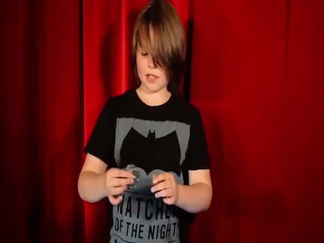 German Kid Performs an Impressive Series of Coin Tricks  (VIDEO)