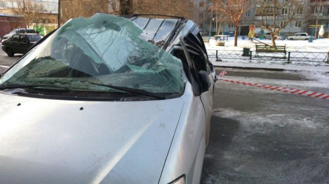High Rise Building Panel Falls on a Parked Car