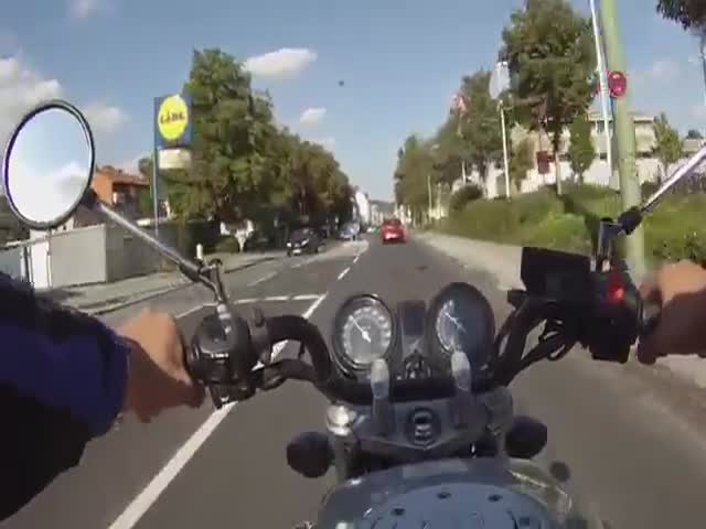 Reckless German Biker Meets Instant Karma  (VIDEO)