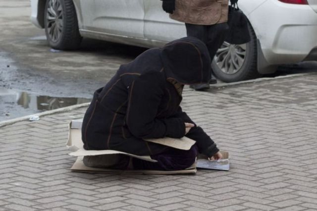 A Beggar with an iPhone Is Pretty Ironic