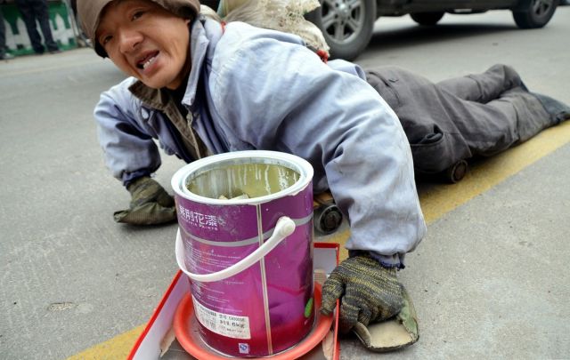 Disabled Chinese Beggar Makes a Surprise Recovery