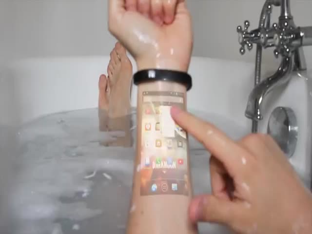 This Futuristic Bracelet Turns Your Arm into a Touch Screen 