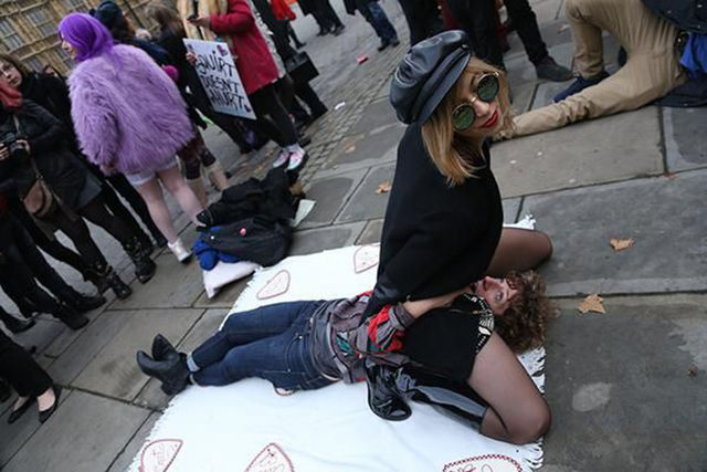 A Bizarre Face Sitting Protest Outside British Parliament 19 Pics