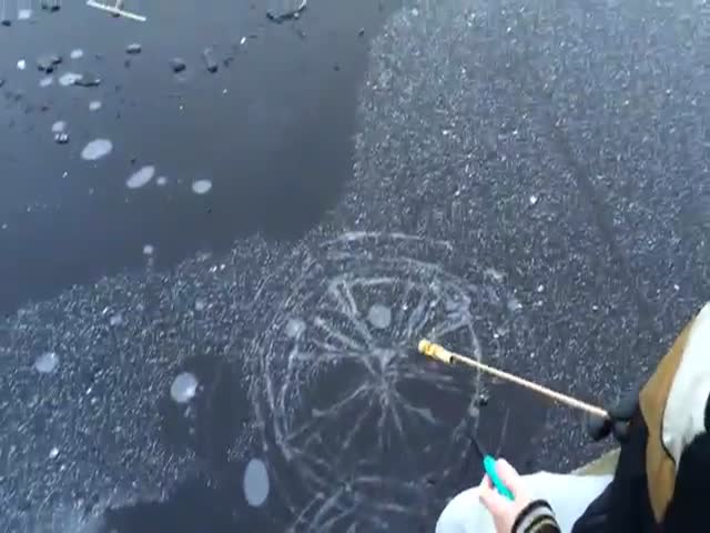 This Is What Happens When You Shoot Fireworks Under the Ice of a Frozen Lake 