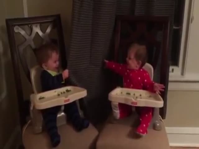 Twin Babies Are Having a Blast Playing Peekaboo  (VIDEO)