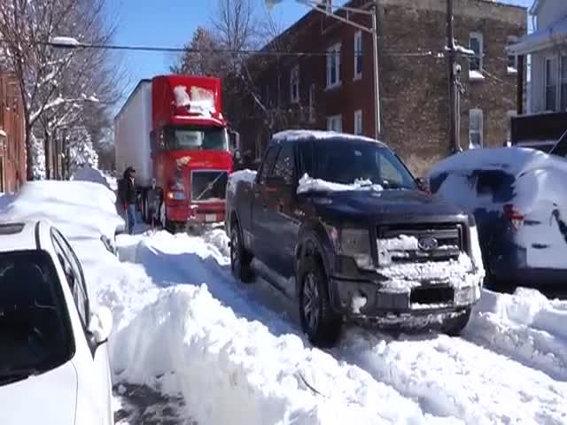 Pickup Truck Tows Semi-Truck Stuck in Snow 