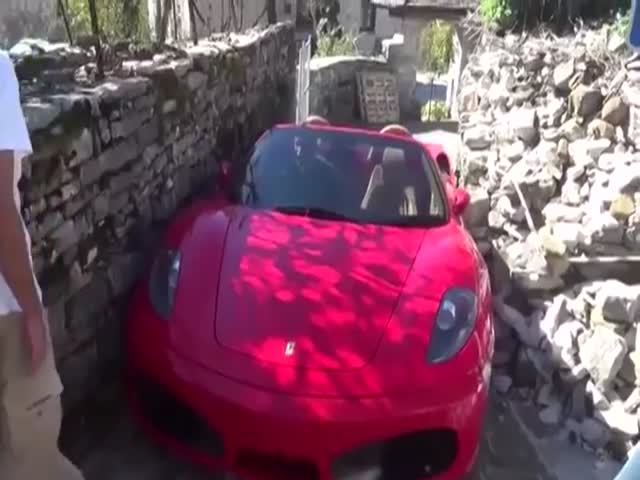 No Way This Ferrari Goes through This Path without a Scratch 