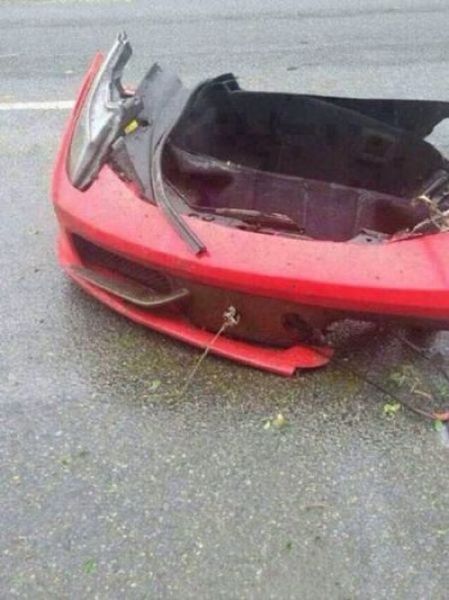 A Ferrari Takes on a Tree and Loses Horribly