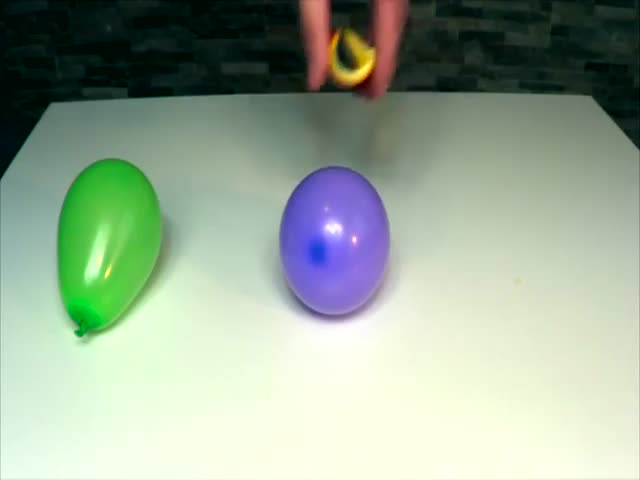 How to Pop Balloons with Orange Peels  (VIDEO)