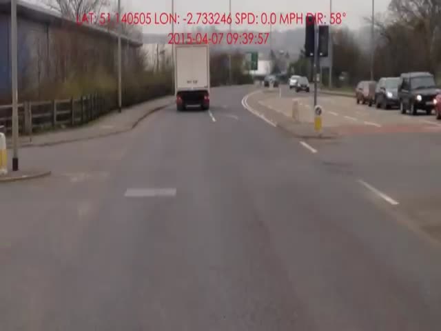 Impatient Driver Tries to Overtake a Truck but Loses Control 
