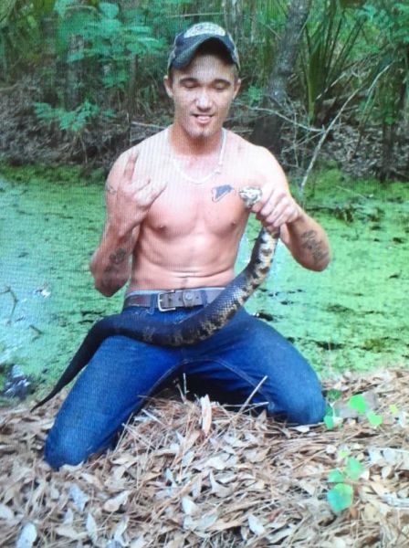 A Reminder Why You Should Never Try to Kiss Poisonous Snakes