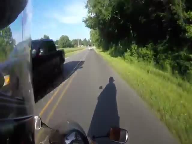 Road Rager Tries to Run Biker Off the Road, Gets Some Sweet Karma  (VIDEO)