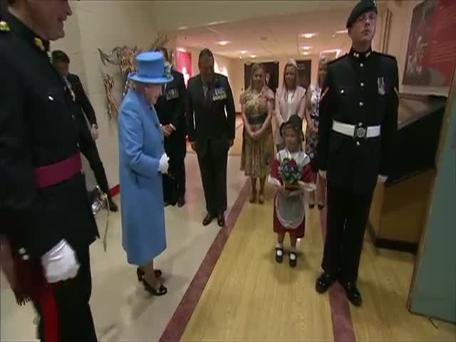 Soldier Whacks a Kid in the Face During a Royal Salute to the Queen